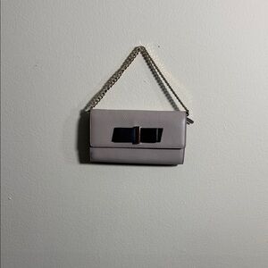 Kate Spade Milou Parchment Drive wallet on a chain.